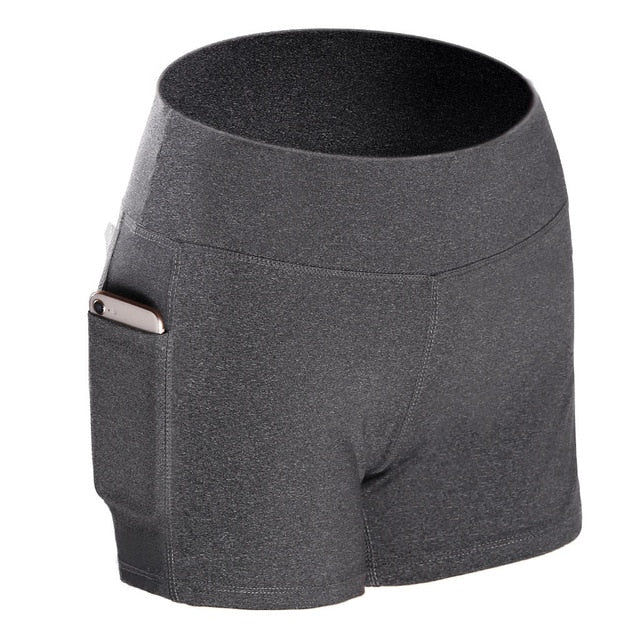 Mujeres Leggings deportivos de fitness Media cintura alta Secado rápido Bolsillo delgado Leggings cortos Mujeres Leggings casuales elásticos.