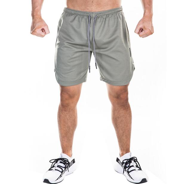 Hombres shorts  de secado rápido fitness , Mens sports quick dry fitness running Gym large size shorts outdoor workout double -deck pants with pockets