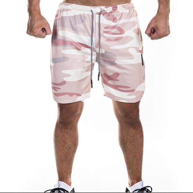 Hombres shorts  de secado rápido fitness , Mens sports quick dry fitness running Gym large size shorts outdoor workout double -deck pants with pockets