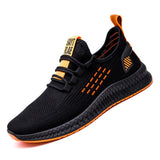 Zapatillas casuales para hombre negras con detalles naranjas y suela resistente de ALL ONLINE 24