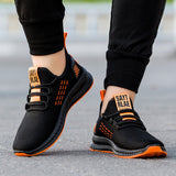 Zapatillas casuales para hombre negras con detalles naranjas y diseno deportivo de ALL ONLINE 24